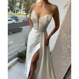 White Satin Gown with Feathers Sweeping the Floor