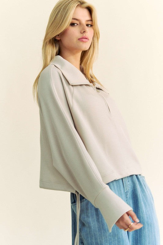 Davi & Dani Drawstring Hem Half Zip Raglan Sleeve Sweatshirt