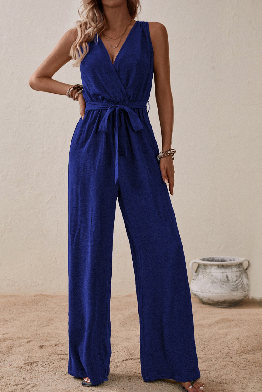 Our Best 100% Polyester Deep-V Sash Tie Belt Loop Detail Surplice Sleeveless Wide Flare Jumpsuit (Multicolor)