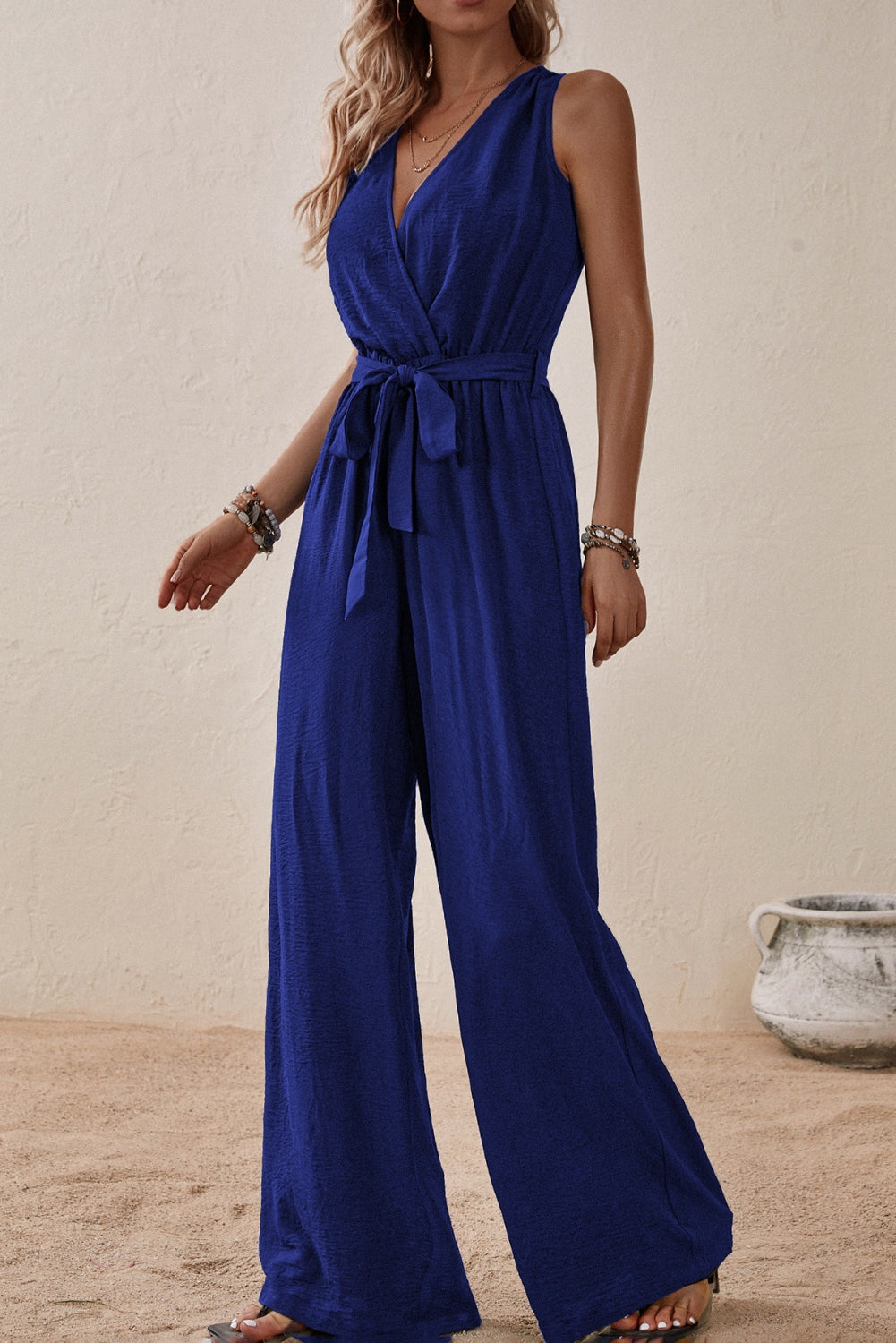 Our Best 100% Polyester Deep-V Sash Tie Belt Loop Detail Surplice Sleeveless Wide Flare Jumpsuit (Multicolor)