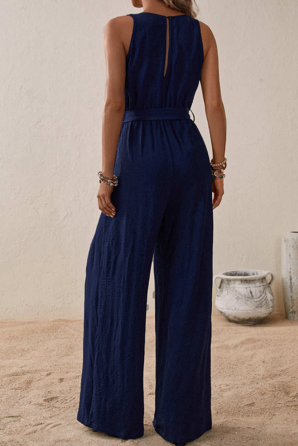 Our Best 100% Polyester Deep-V Sash Tie Belt Loop Detail Surplice Sleeveless Wide Flare Jumpsuit (Multicolor)