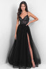 Black lace evening gown with a high slit on a white background