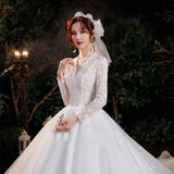 Elegant Lace Bridal Gown with Long Sleeves and Train