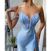 White Satin Gown with Feathers Sweeping the Floor
